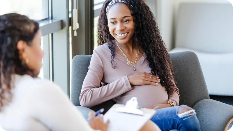 postpartum-depression-mother-discussing-with-doctor