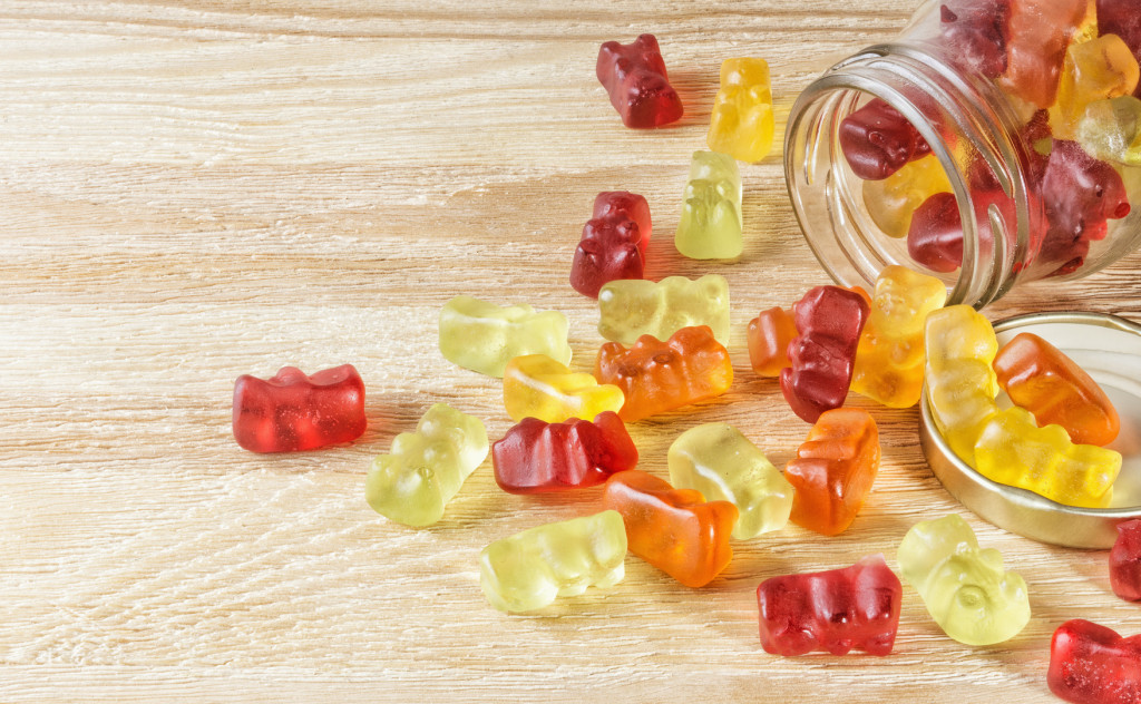 children's vitamins, gummy bear vitamins in a glass bottle.