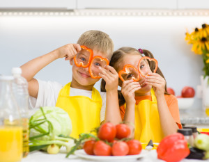 Vegetarian Diet Tips for Children. Kids playing with vegetables.