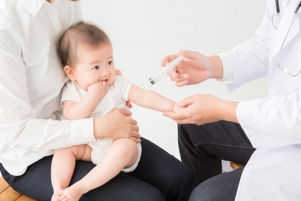 baby receiving a vaccine